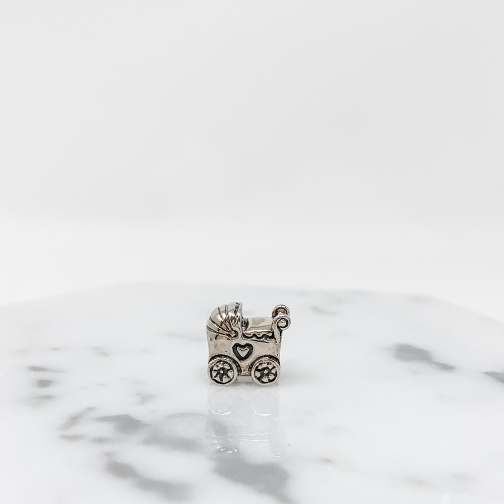 Pandora sterling silver baby carriage charm